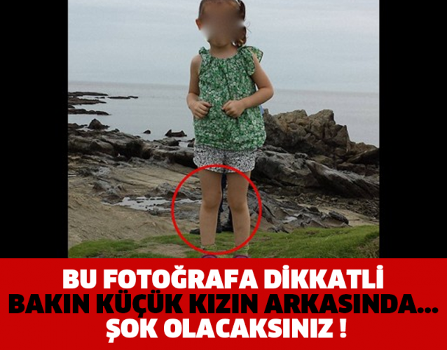 BU FOTOĞRAFA DİKKATLİ BAKIN KÜÇÜK KIZIN ARKASINDA... ŞOK OLACAKSINIZ !