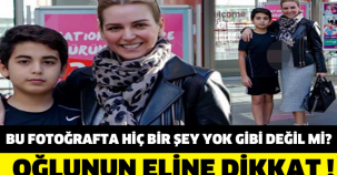 BU FOTOĞRAFTA HİÇ BİR ŞEY YOK GİBİ DEĞİL Mİ? OĞLUNUN ELİNE DİKKAT !